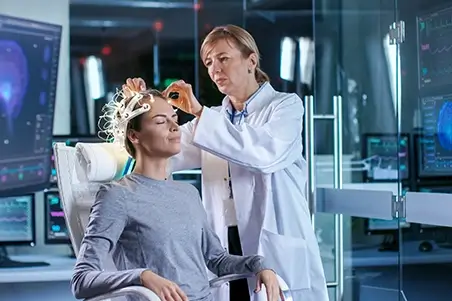 A doctor fitting a brain mapping device on a patient