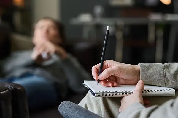 A doctor and patient at a therapy session